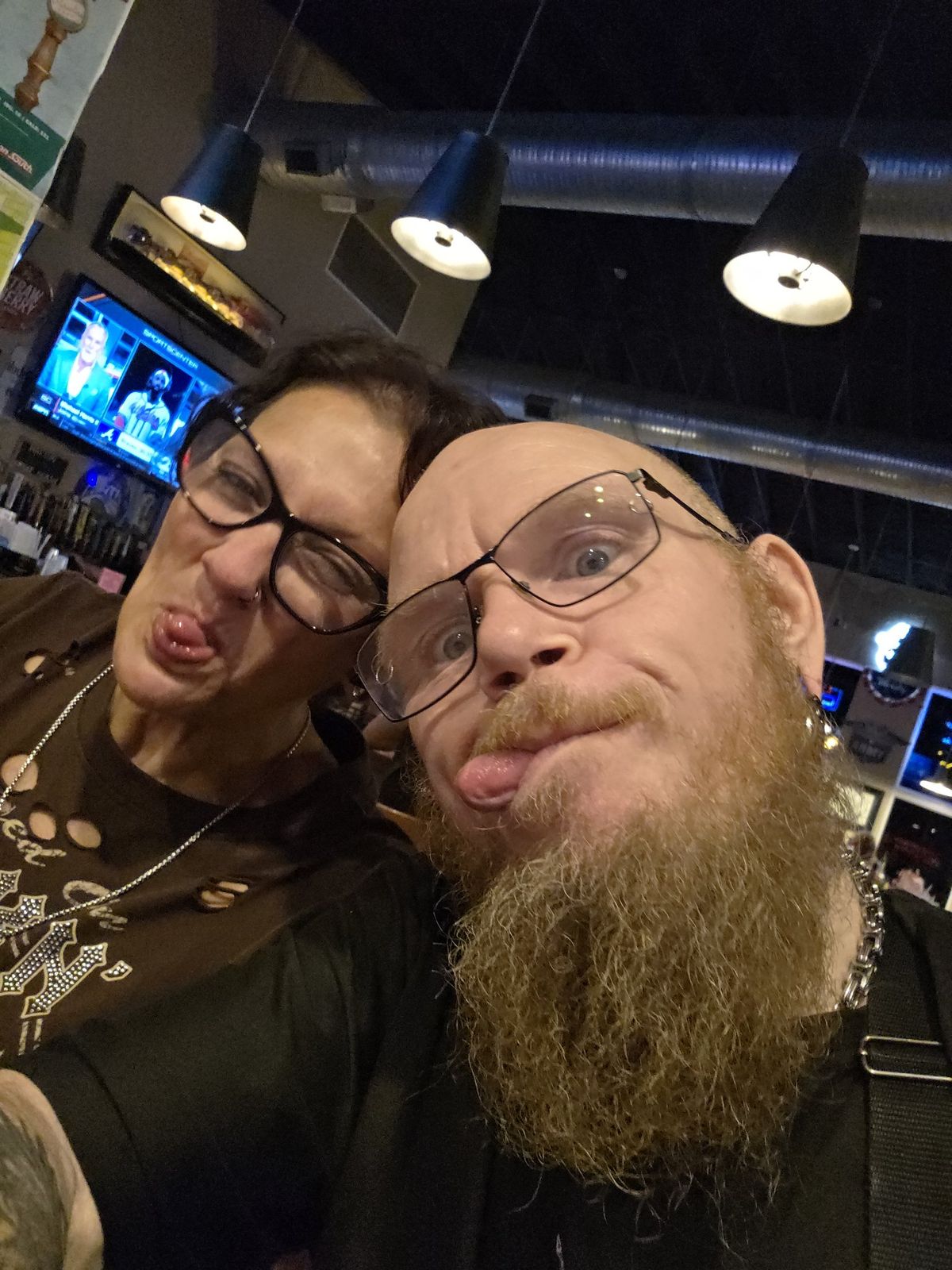 Tank and Sandra making goofy faces together