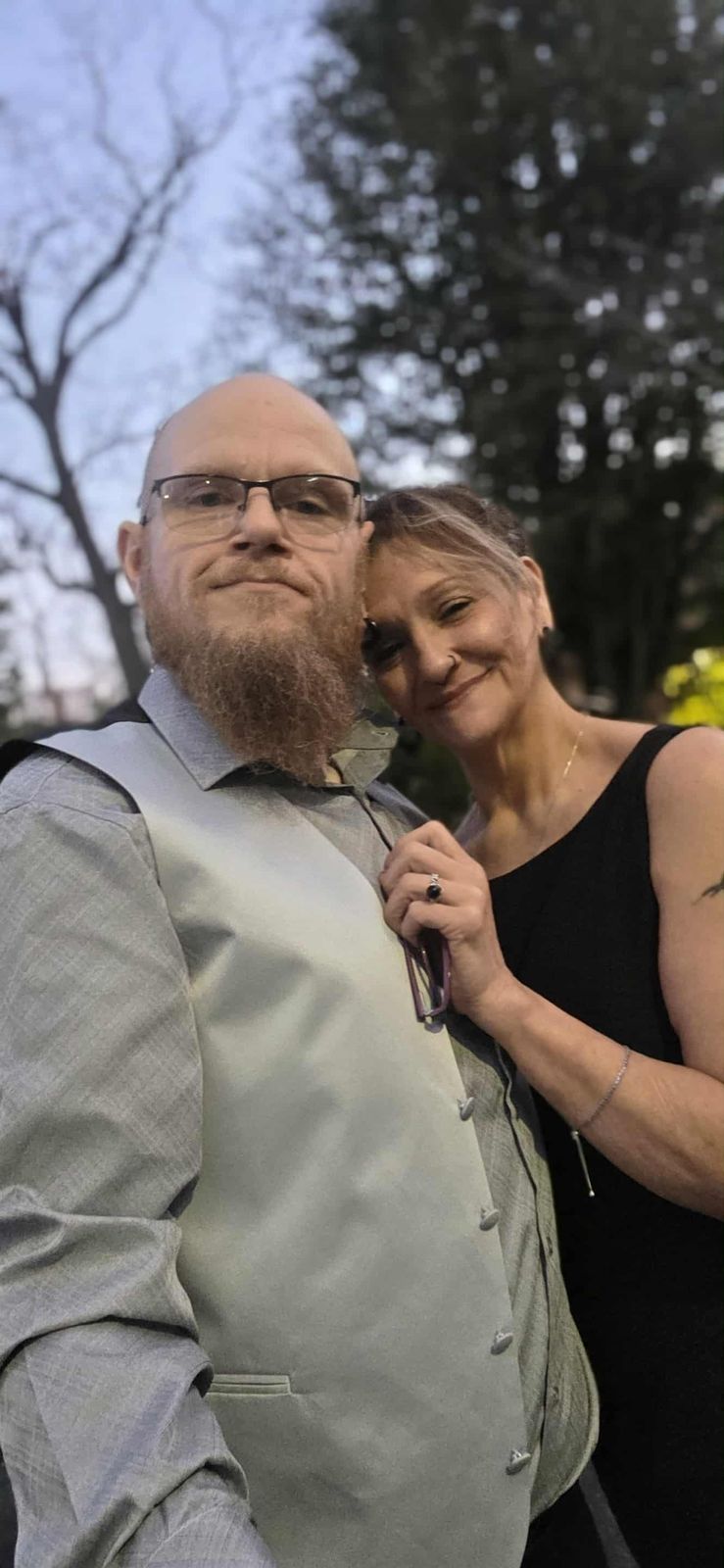 Tank and Sandra dressed up together outdoors