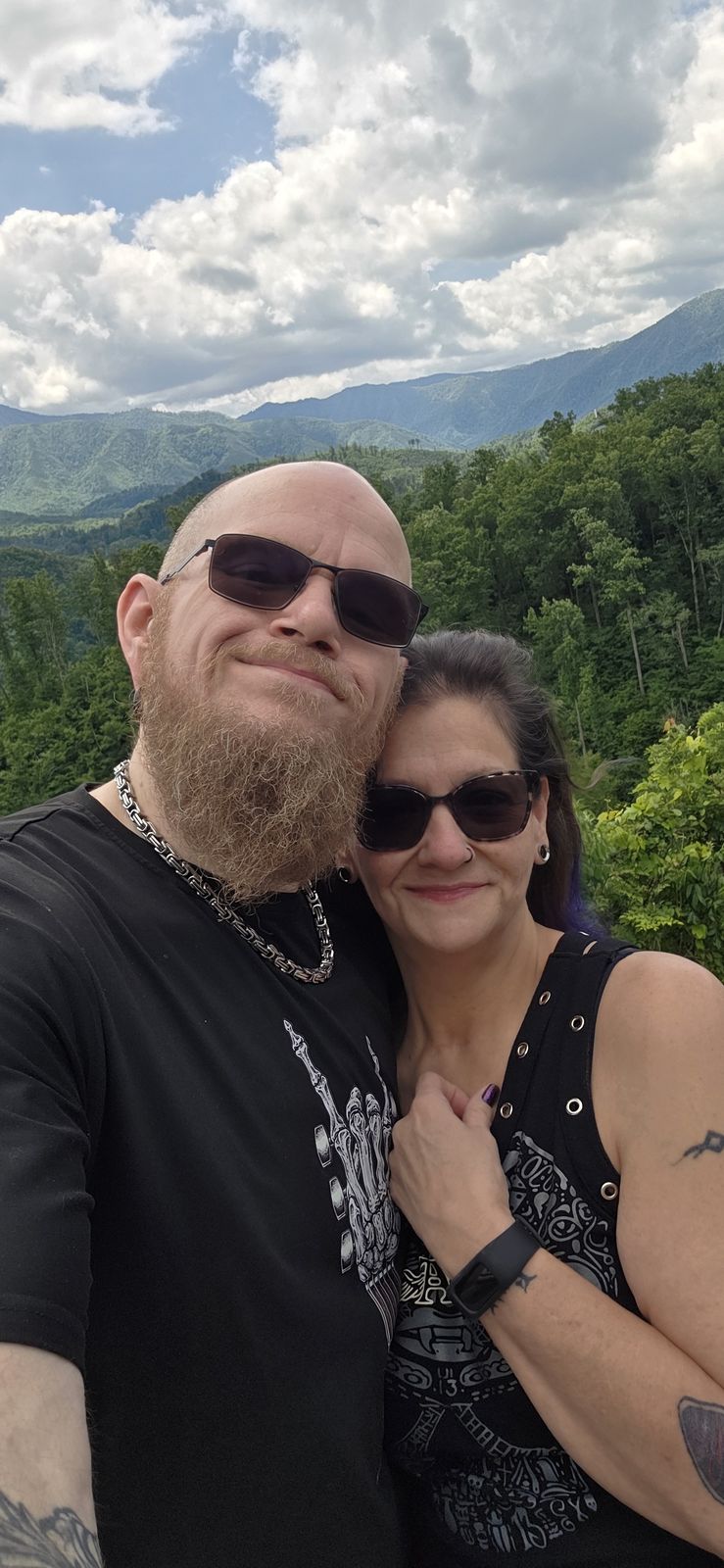 Tank and Sandra together at a mountain overlook